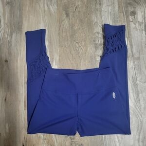 Free People Movement cropped leggings size medium with bottom cut out details